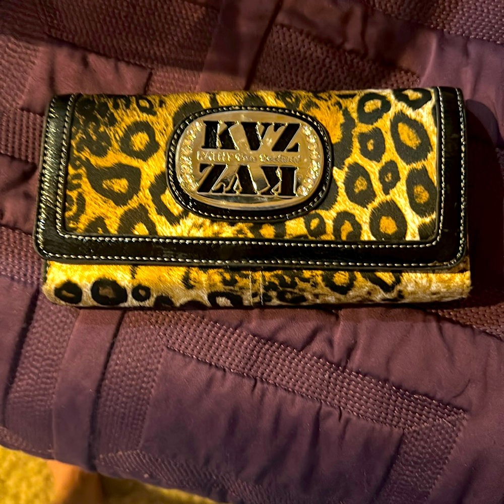 Zebra print wallet 7 1/2 inches width, 4 inches height quarter inch wide